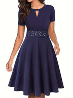 Blue Dress with Elegant Lace Accents and Tailored Waist
